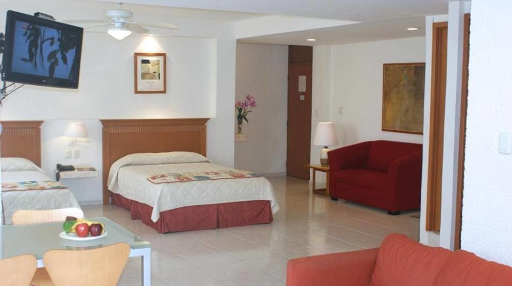 Hotel Y Suites Nader Cancún Buitenkant foto